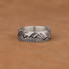 Handmade Silver Mountains and Sky Statement Band Ring, Brutalist Jewelry, Stackable Oxidized Biker Rings for them, Avant Garde Jewelry Gifts Made of 925 silver and handcrafted by hand, this ring is not only an accessory piece that complements your daily elegance, but also has details that will reflect your character and style. It is also a great gift to give to your loved ones on their special days. At SavisSilver, we always give importance to the satisfaction of our customers, we recommend you Vintage Silver Jewelry For Outdoor, Durable Silver Jewelry Gift, Durable Silver Metal Ring, Durable Silver Promise Ring, Round Durable Jewelry For Gifts, Rustic Ring Jewelry Gift, Nickel-free Stainless Steel Vintage Rings, Vintage Nickel-free Stainless Steel Rings, Handmade Vintage Stainless Steel Rings