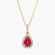 The rich red tone of the pear-cut ruby at the heart of this pendant is sure to mesmerize. Shimmering accent diamonds form a halo around it and sparkle along the bale of the yellow gold design. Ruby Diamond Pendant, Halo Pendant, Ruby Diamond, Precious Gemstones, Gold Design, Halo Diamond, Gemstone Necklace, Pear, Ruby