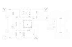 the floor plan for an apartment building with several rooms and two floors, all in white