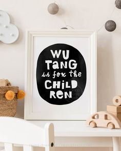 a framed black and white poster with the words wu tang is for the child on it