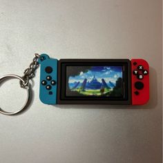 a video game keychain is shown with an image on it