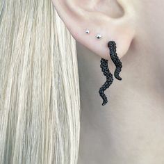 Add a touch of edginess to your wardrobe with our Octopus Tentacle earrings. The unique ear jacket design features intricate octopus tentacle, making a bold statement. Sold as pair Material : 316 Stainless steel Size: Front tentacle 3/4 inch, Back tentacle 1 1/4 inches Closure: push back Listing for pair of earrings only Tentacle Earrings, Octopus Earrings, Octopus Jewelry, Edgy Earrings, Octopus Tentacles, Ear Jacket Earring, Gothic Earrings, Ear Jacket, Cuff Rings