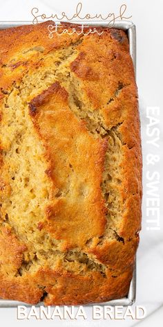 a loaf of banana bread sitting on top of a metal pan with text overlay