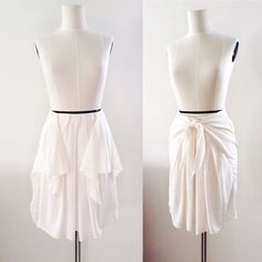 ~Retailed For $662! This 3.1 Phillip Lim Knee-Length Silk Skirt Features A Knotted Tie Overlay & Elegant Front Pleating. Size 0-2 But Mid-Rise Waist & Gathered Elastic Waistband Allows For Plenty Of Stretch. Waist Circumference Is 26.5" (Excluding Stretch). Draped Side Panels W/ Slash Hip Pockets. Inner Chiffon Lining. On Tone Stitching. Concealed Back Zipper W/ Hook & Eye. 100% Silk. ~Ivory Colour. Tiny Faded Pen Mark In Front. I Haven't Tried Removing, But Perhaps A Talented Dry Cleaner Can! Skirt Draping, Ivory Colour, Tie Skirt, Waist Circumference, Silk Skirt, 3.1 Phillip Lim, Hook Eye, Side Panels, Phillip Lim