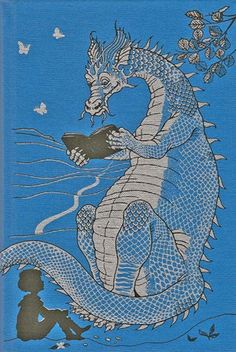 a blue book with an image of a dragon on it