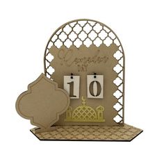 a card with the number ten on it and an ornate frame in front of it