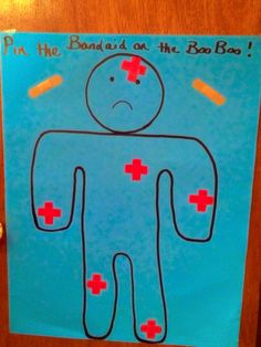 a child's drawing of a man with red crosses on his chest