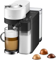 an espresso machine with three different types of coffee