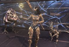 two alien like creatures standing in front of a large screen with their arms up and hands out