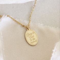 "Gloria in excelsis Deo" "Glory to God in the highest" * This listing is for one (1) necklace that is engraved front and back and can be worn both ways! * Lengths: 17" + 2" extender. Lengthens up to 19" * Measurements: 15mm x 11mm charm * Chain: Delicate simple chain * Finish: 18K gold over surgical or polished surgical steel. Tarnish resistant and waterproof. * Nickel Free and Lead Free. Hypoallergenic. * All our jewelry is packaged in signature LoveStory Collection by MAIVE gift boxes. If you would like multiple items from your order packaged separately please let us know! Please message us if you have any questions about our products, styling, or recommendations. We are happy to help! © 2023 LoveStory Collection by MAIVE Necklace Christian, Faith Necklace, Faith Jewelry, Simple Chain, Glory To God, Charm Chain, Oct 31, Christian Faith, Gift Boxes