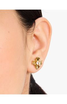 For signature kate spade charm, these pretty pansy stud earrings are illuminated by a sparkling cubic zirconia at the center. 1/2" diameter Post back Goldtone plate/cubic zirconia Imported Affordable Kate Spade Wedding Jewelry, Kate Spade Huggie Earrings, Kate Spade Earrings, Earrings In Gold, Fabric Gift Bags, Keep Jewelry, Fabric Gifts, Free Fabric, Print Gifts