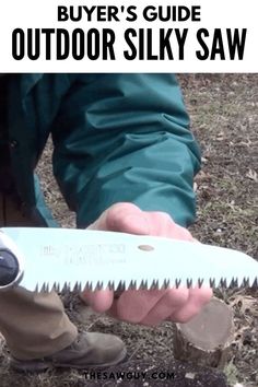 a man holding a large saw in his hands with the words buyer's guide outdoor silky saw