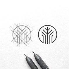 some type of logo that is designed to look like an abstract tree and two circles