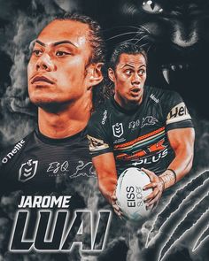 two men in black jerseys holding a rugby ball