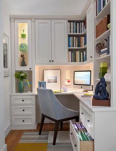 a home office with built - in bookshelves, desk and chair is shown