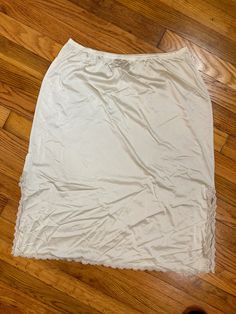 Vintage 1970s Beige Slip Half/Skirt Slip Vanity Fair 🤍🤎 Beige Slip with side slits  70s vanity fair - "med TT" Flaws: some faint stains - nylon Antron  Waist: 28" - 38" Hips: 40" - 48" Length: 26" Beige Vanity, 70s Vanity, Lingerie Design, Camilla Mendes, Satin Homecoming Dress, Half Skirt, Lace Slip Dress, Lace Slip, Designer Lingerie