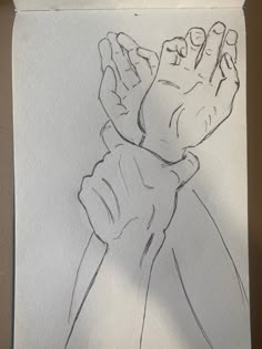 a drawing of a hand holding something in it's right hand, on top of a piece of paper