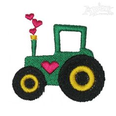 a green tractor with pink hearts on it's front and the back end is embroidered onto