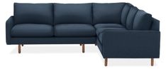 a blue couch and ottoman sitting next to each other on a white background with one arm extended