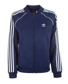 Included in this listing is the WOMEN'S SUPERSTAR TRACK TOP JACKET from ADIDAS ORIGINALS. This jacket is featured in DARK BLUE. Women's size MEDIUM, LARGE or X-LARGE. Brand new with tags.  All items come from a smoke-free and pet-free environment.  Please know your size, view all photos and ask all questions before bidding.  Description from Adidas: "The best of Adidas past, remastered for the present. The SST track jacket was originally designed for tennis court warm-ups. This version is made o Adidas Track Top Outfit, Adidas Blue Jacket, Adidas Jacket Outfit Street Style, Adidas Jacket Outfit, Adidas Sst, Adidas Originals Jacket, Adidas Zip Up, Tricot Fabric, Navy Blue Jacket