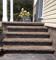 stone steps leading up to a house