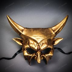 Product Description:The Demon Sharp Horn Devil Masquerade Mask In Metallic Silver Is A Stunning And Eye-Catching Accessory That Is Perfect For Any Masquerade Event. Made From High-Quality Plastic Material, This Mask Is Molded And Plastered To Perfection To Create A Durable And Long-Lasting Product. The Intricate Detailing, Including The Sharp Horns, Is Then Carefully Hand-Crafted Using Gold Foil, Giving The Mask An Impressive And Shimmering Shine. To Ensure Its Longevity, The Mask Is Protected W Halloween Masquerade Ball, Masquerade Couple, Masquerade Event, Masquerade Mask Black, Venetian Costume, Light Up Hats, Devil Mask, Venetian Masquerade Masks, Metallic Gold Color