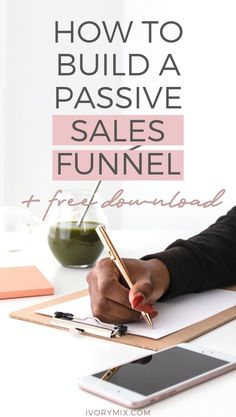 a person writing on a notepad with the words how to build a passive sales funnel