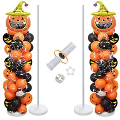 two tall halloween decorations with pumpkins and bats