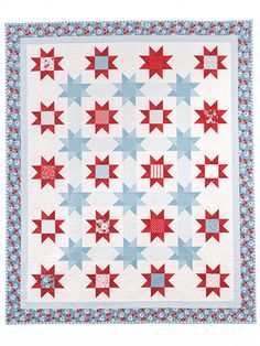 a red, white and blue quilt with stars on it