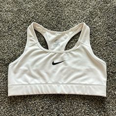 Nike Sports Bra Size: M Color: White Never Worn White Racerback Activewear For Light Sports, White Sports Bra For Workout, White Sports Bra For Light Sports, White Athletic Fit Racerback Sports Bra, White Racerback Sports Bra For Light Sports, White Sports Bra For Gym, White Racerback Activewear For Sports, White Sleeveless Sports Bra For Light Sports, Basic White Activewear