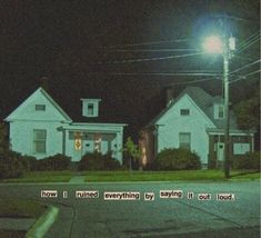 an image of a street at night with the words slow written in front of it