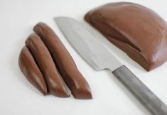 three photos of chocolate pieces being cut and placed on top of each other with a knife