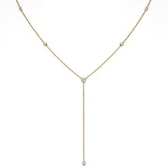 Logan Hollowell Online & In-Store Exclusive14k gold and diamond lariat necklace with .50 total carat weight of white diamonds. Six round white diamonds. 20" around the neck with a 3" drop. Logan Hollowell, Droplet Necklace, Diamond Star Necklace, Bezel Jewelry, Bezel Necklace, Round Necklace, Diamond Star, Solid Gold Jewelry, Lariat Necklace