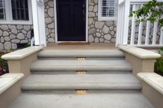 steps leading up to the front door of a house