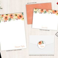 an assortment of stationery and envelopes with flowers on them