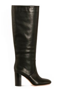 Pull on, knee high boot in smooth, matte leather with a stacked heel 3.5" heel, almond toe and padded footbed. 100% leather.  *Fit: Goldy fits true to size and slightly narrow in the shaft. May require some additional breaking in for a soft feel on the shaft. Black Heeled Boots, Loeffler Randall Shoes, Breaking In, Black Heel Boots, Tall Boot, Loeffler Randall, Tall Boots, Stacked Heel, Knee High Boots