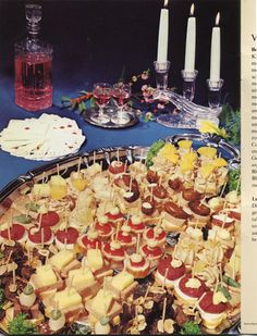 an assortment of appetizers are displayed on a platter