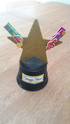 a star shaped object on top of a wooden table