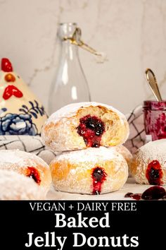 Many baked vegan jelly donuts are on a kitchen table with a jar of jelly and a ceramic chicken in the background. The donut on top has a bite taken out of it so you can see the fluffy inside. Text on the image reads, "vegan and dairy free baked jelly donuts". Jelly Custard, Jelly Donuts, Whipped Coconut Cream, Vegan Jelly, Easy Overnight Oats, Coconut Whipped Cream, Ideas For Breakfast, Vegan Kitchen, Apple Pies Filling