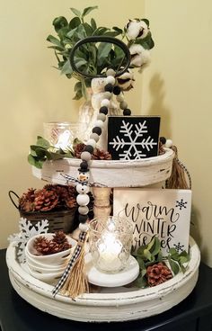 a table topped with plates and bowls filled with food next to a sign that says warm winter