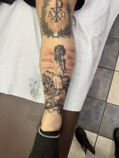 a man with a tattoo on his leg