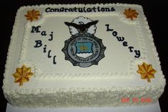 a cake that is decorated with the words congratulationss and an eagle on it's side