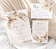 the wedding stationery is laid out on a plate