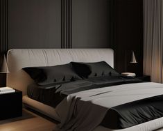 a bed with black sheets and pillows in a dark room next to two lamps on either side of the bed