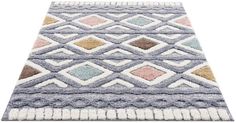 an area rug with various colors and patterns on it, including blue, pink, yellow, white and grey