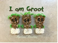 three small crocheted hearts with green leaves on them and the words, i am groot