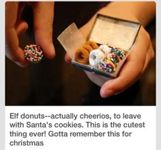 two hands holding an open box with donuts in it and the caption reads elf donuts actually cherros, to leave with santa's cookies this is the cutest thing