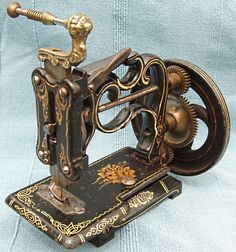 an old fashioned sewing machine is on display