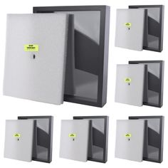 six different types of wall mounted paper dispensers with yellow tags on them