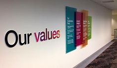 an office wall that has the words our value on it